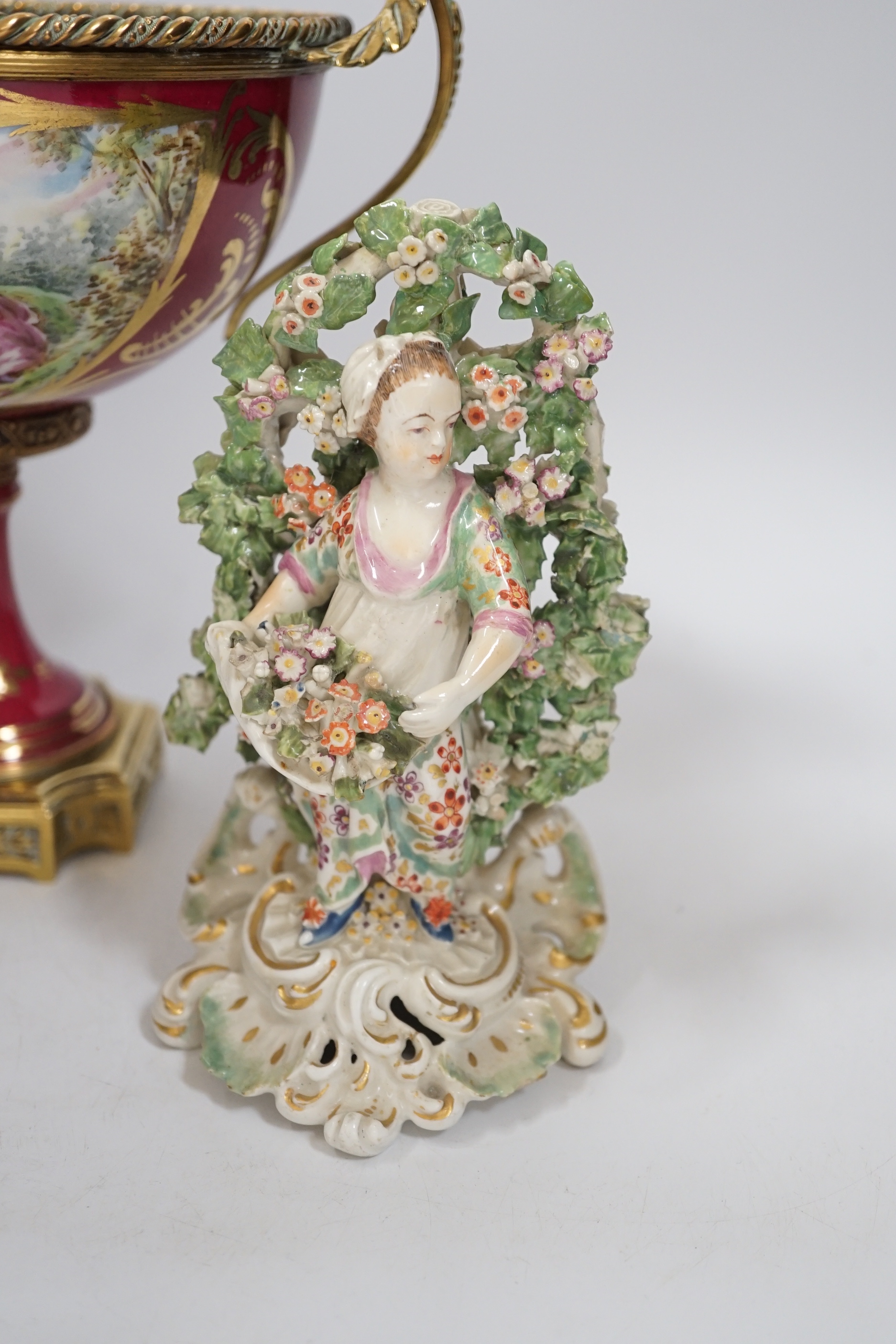 A pair of Derby figures, c.1775, a Paris porcelain gilt metal mounted comport and a glass jar, 21cm high